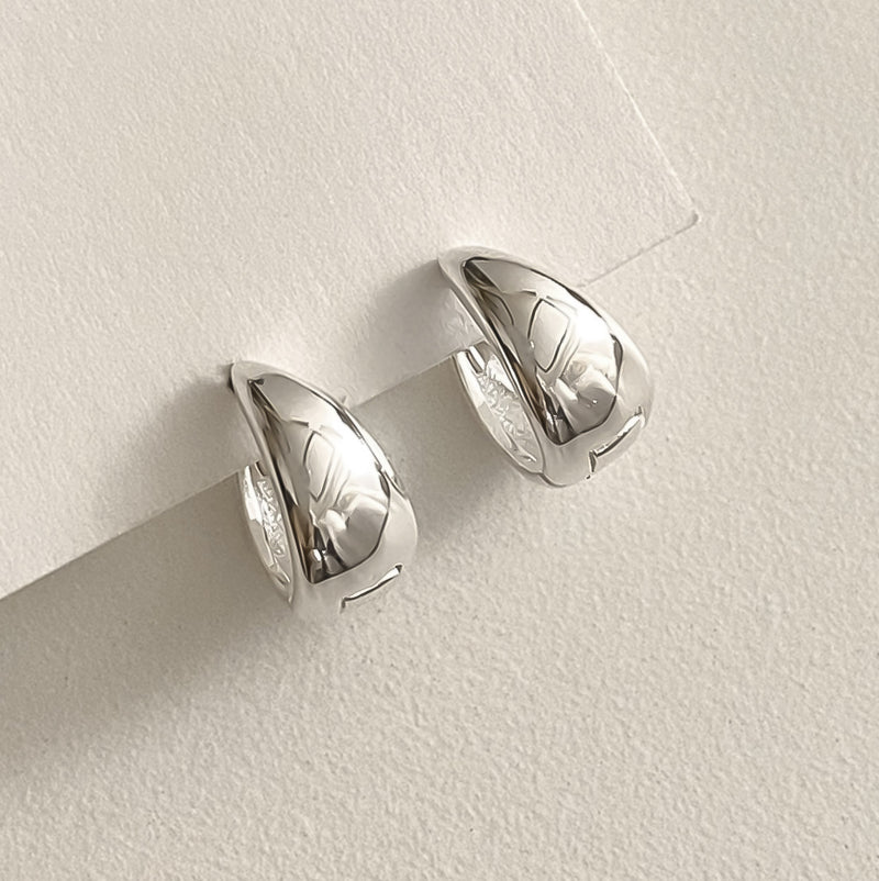 Sleek and bold sterling silver dome hoops