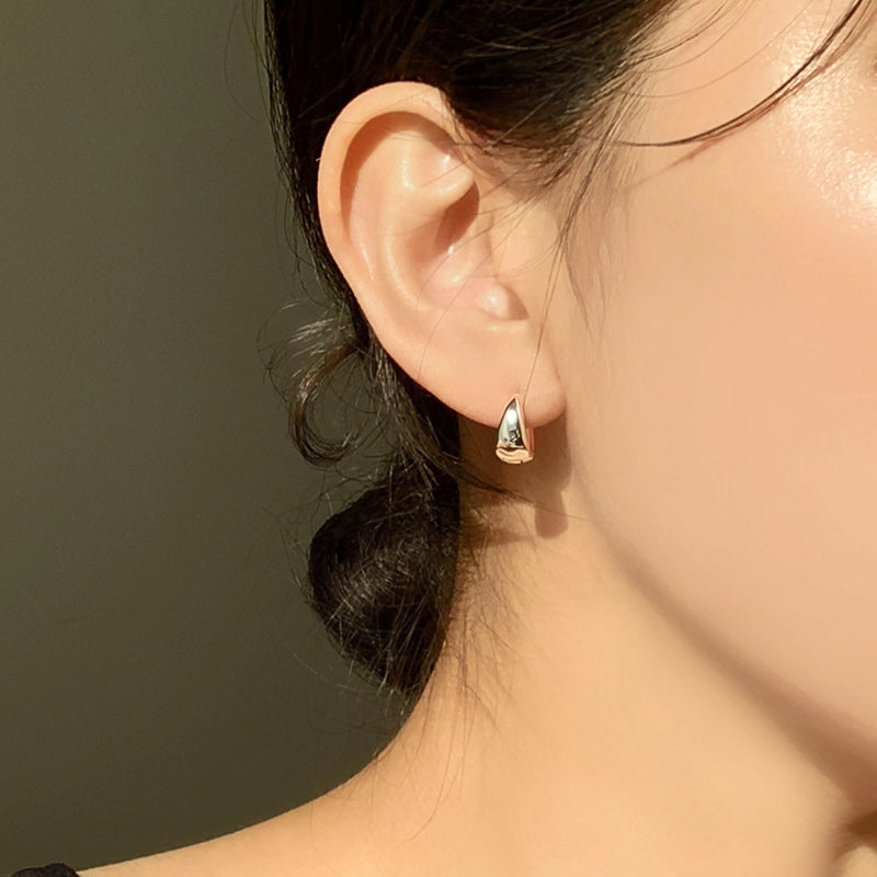 Sculptural chunky silver huggie earrings