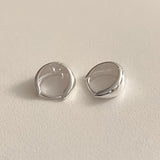 Contemporary sterling silver teardrop hoops