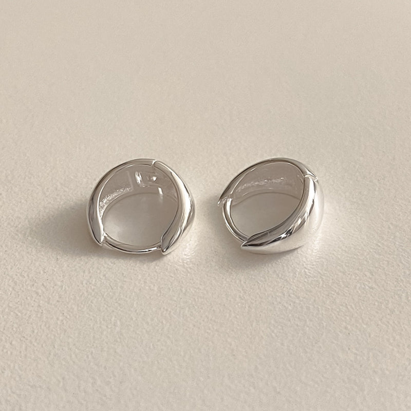 Contemporary sterling silver teardrop hoops