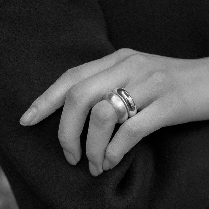 Bold dome-shaped sterling silver ring with a soft matte finish and rounded band, designed for timeless elegance and everyday minimal luxury style.