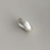 Classic bold matte silver ring with a soft brushed surface and domed body, ideal for lovers of clean design and quiet, refined luxury.
