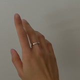 Classic flat band ring crafted from sterling silver, measuring 1.5mm in width. Sleek and simple with a mirror-like surface.