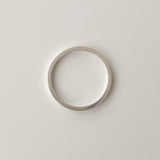 Timeless silver ring with a flat 1.5mm profile, handcrafted from sterling silver. Perfectly understated for any look.

