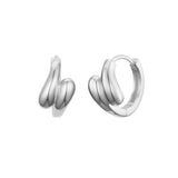 Sterling silver huggie hoop earrings featuring a sculptural double teardrop dome design. Each earring is crafted with a polished high-shine finish and organically curved silhouettes that give it a bold yet elegant feel, ideal for both statement styling and everyday wear.