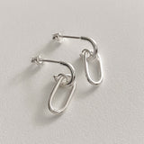 Sterling silver drop earrings with an open-link oval chain design that softly sways with motion, bringing a touch of elegance and artistic minimalism to your jewellery collection.

