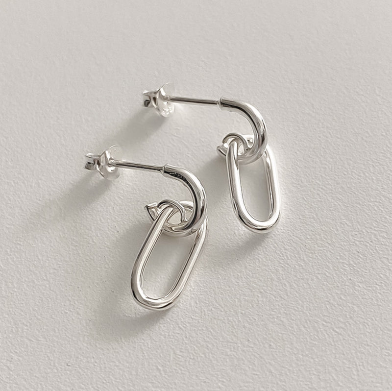 Sterling silver drop earrings with an open-link oval chain design that softly sways with motion, bringing a touch of elegance and artistic minimalism to your jewellery collection.

