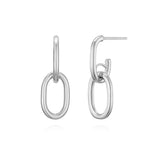 Sterling silver oval chain link drop earrings featuring a clean, minimal silhouette with polished interlocking links that create a sculptural sense of movement and light reflection.