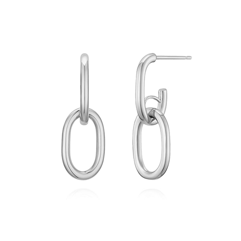 Sterling silver oval chain link drop earrings featuring a clean, minimal silhouette with polished interlocking links that create a sculptural sense of movement and light reflection.